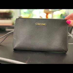 Sleek Calvin Klein wristlet/clutch